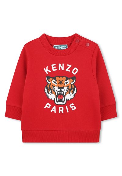 Sweat-shirt rouge avec un graphique de tigre et le texte "KENZO PARIS". Material doux, poignets côtelés et pressions sur les épaules pour un habillage facile.