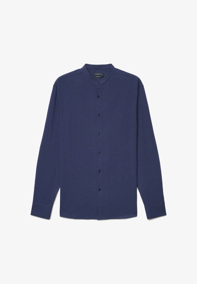 Chemise bleu marine à manches longues avec col mandarin et boutons sur le devant, en tissu texturé, présentée à plat sur fond blanc.