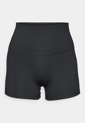 Shorts noirs taille haute en tissu lisse. Présente un design sans couture et des coutures étroites le long de la taille et des jambes.