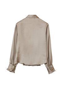 Satin shirt in light beige with long sleeves, buttoned cuffs featuring ruffles, and a classic collar. Smooth texture and relaxed fit.