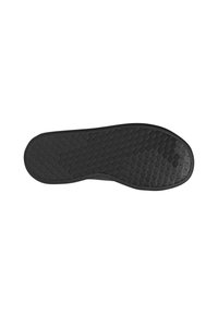 Plantilla de zapato negra con un patrón hexagonal en la superficie inferior, diseñada para proporcionar amortiguación y soporte.