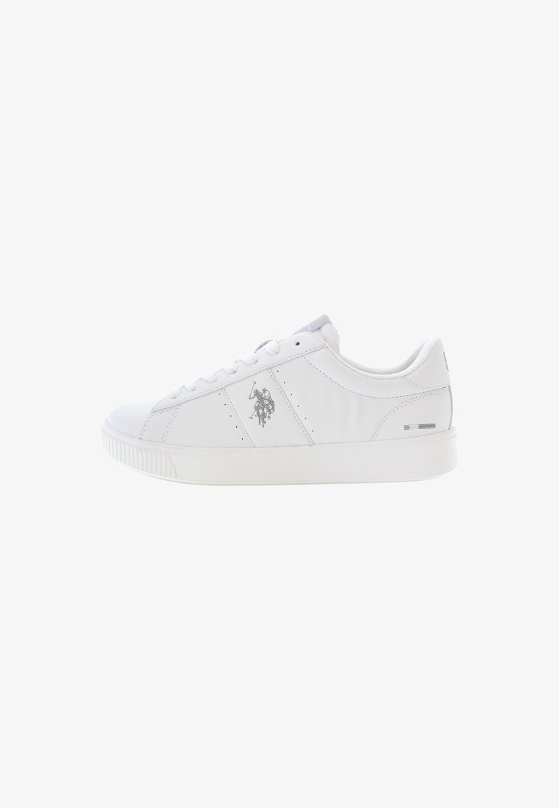 White leather sneaker with a smooth surface, round toe, flat laces, and a silver logo on the side. Features a textured rubber sole.