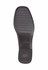 Suola di scarpa in gomma nera con un motivo testurizzato e scanalature orizzontali; presenta il marchio impresso e dettagli sulla taglia.