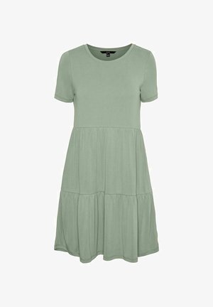 Robe à manches courtes, longueur genou, en coton doux et léger. Comprend un col rond et une jupe à volants de couleur vert pastel.