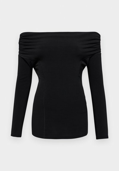 Must have pikka, pikad varrukad, avatud õlgadega disain. Omab kogunenud detaile õlgadel ja keha lähedast siluetti. Sile tekstuur.