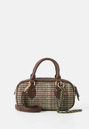 Small rectangular handbag with brown leather handles and trim, featuring a multicolored houndstooth fabric and a green braided keychain.