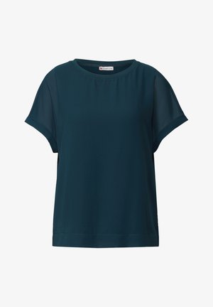 Haut à manches courtes teal avec un col rond, fabriqué en tissu léger. Coupe ample avec une texture lisse et un ourlet propre.