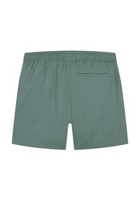 Groene, lichte shorts met een textuurstof, een elastische tailleband en een enkele achterzak voor extra functionaliteit.