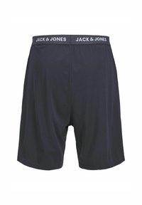 Černé bavlněné boxerské slipy s elastickým pasem a logem "JACK & JONES". Jednoduchý design s hladkou texturou a rovný střih.