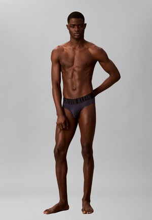 Calvin Klein, - Figi