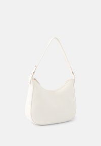 White leather shoulder bag with a curved shape, single strap, and gold-tone zipper hardware. Smooth texture with subtle stitching detail.