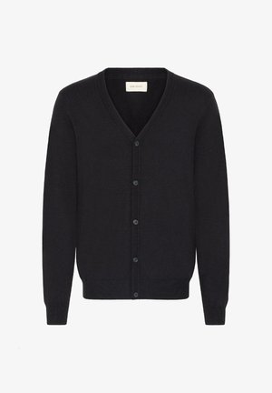 Musta neuletakki, joka on valmistettu pehmeästä neulekankaasta. Siinä on V-pääntie, pitkät hihat ja nappi-etumus, jossa on kuusi pientä nappia.