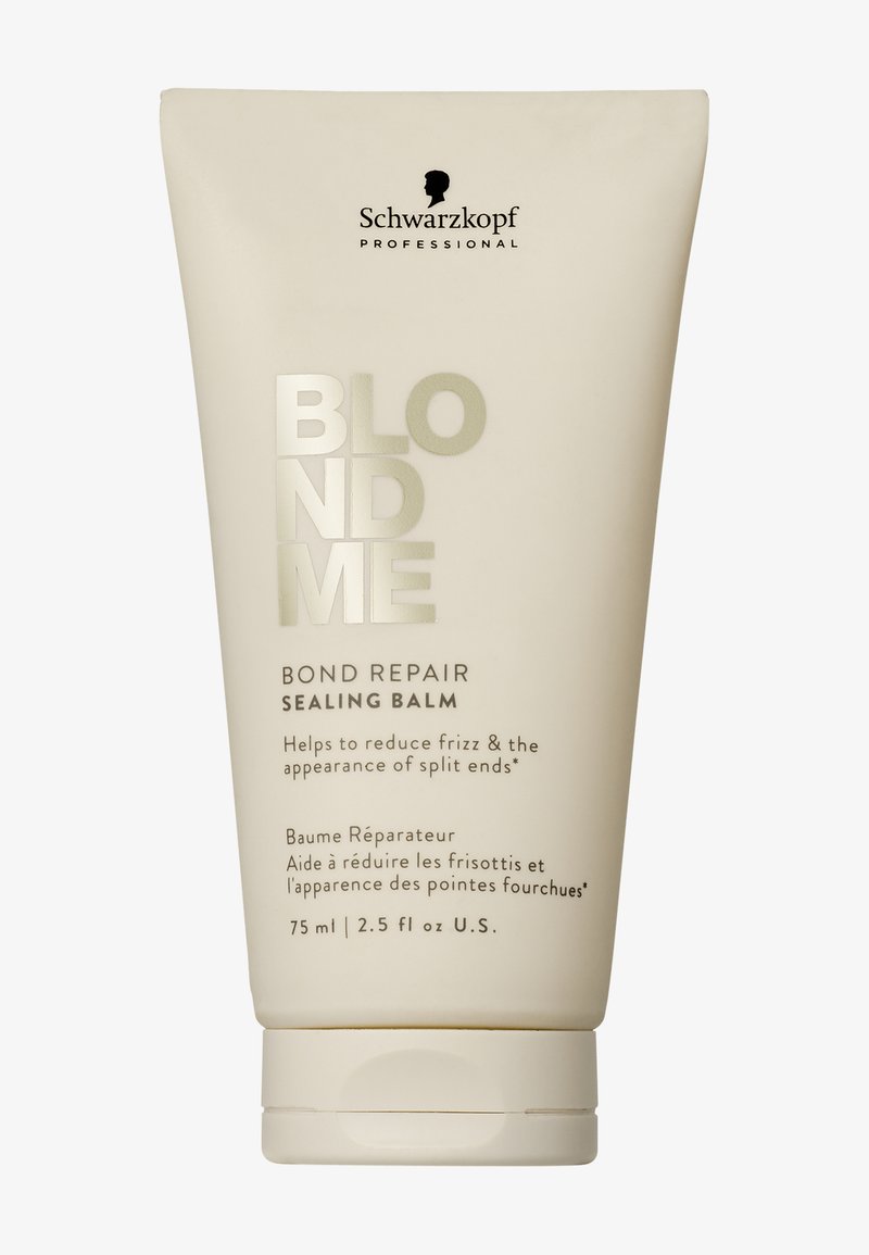 Baume de scellement réparateur BLONDME Bond Repair de Schwarzkopf dans un tube crème pâle. Texte argenté audacieux et bouchon à bascule. Taille 75 ml.