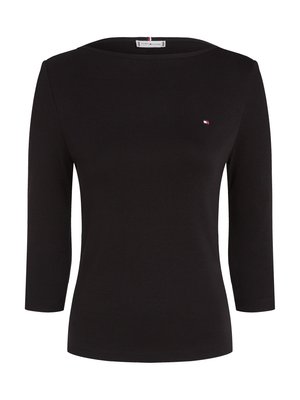 Schwarzes Langarmshirt mit Rundhalsausschnitt und gerippter Textur. Mit kleinem Logo auf der linken Brust und figurbetonter Silhouette.