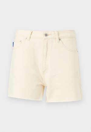 Kremfargede denimshorts med rett snitt, med frontknapp og fem lommer. Teksturert stoff med sømdetaljer.