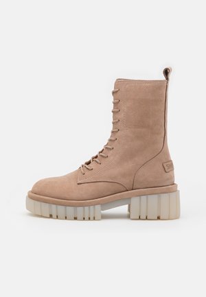 Platform ankle boots - beige