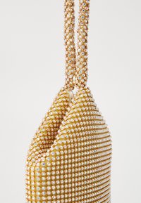 Mascara BÉBHINN - Rokassoma - gold-coloured