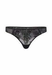 String noir en dentelle avec des motifs floraux, des panneaux transparents et une taille noire solide. Il comprend un détail en métal doré à l'arrière.