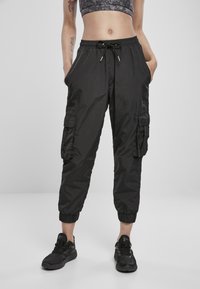 Urban Classics - LADIES HIGH WAIST CRINKLE NYLON CARGO PANTS - Tracksuit bottoms - black Thumbnail Image 1