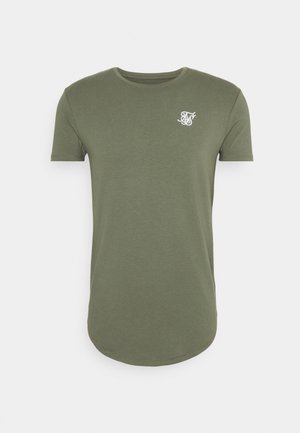 T-shirt vert olive à manches courtes, encolure ronde, coupe droite, texture douce, avec un logo blanc sur le côté gauche de la poitrine, ourlet incurvé.