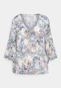 Blouse à motif floral aux couleurs pastel, avec un col en V, des manches évasées trois-quarts et une coupe décontractée cintrée à la taille.