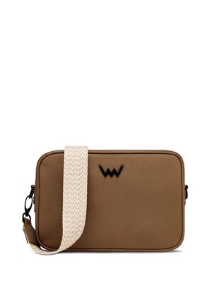 Brown rectangular bag made of textured fabric, featuring a white patterned strap and a black logo accent on the front. Zipper closure.