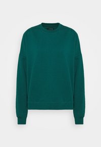 Felpa crewneck color teal realizzata in morbido misto cotone. Presenta maniche lunghe, polsini a costine e una vestibilità comoda. Design semplice senza motivi.