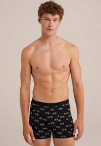 Juodi bokseriai su dviračių raštu raudona ir žalia spalvomis. Pagaminti iš minkštos medžiagos, su priglundančiu dizainu ir elastinga juosta.