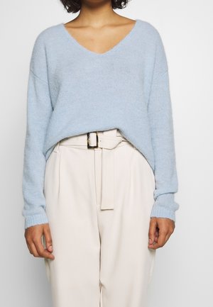 Stickad tröja - light blue