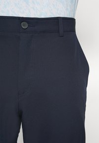 Calvin Klein Golf BULLET REGULAR FIT TROUSER - Παντελόνι - navy