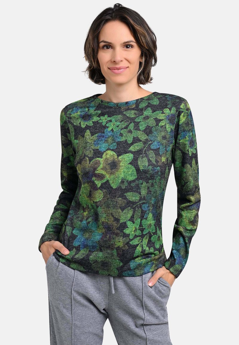 Floral long-sleeve top in dark gray fabric, featuring green and blue flower patterns, round neckline, and a relaxed fit. Grey pants included.