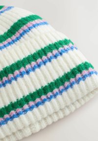 Knit hat featuring horizontal stripes in green, blue, and pink on a white base, with a ribbed texture and soft, fuzzy material.