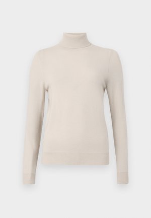 Heledbeez turtleneck-sweater, mille pikkade varrukatega, ribbetud krae ja mansetid, valmistatud pehmest materjalist, iseloomulik lihtne disain.