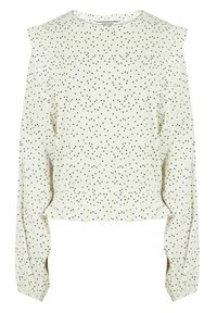 Langemouwige top in crème met zwarte stippen, met ruches, een gather-zoom en een textiel met een lichte rek.