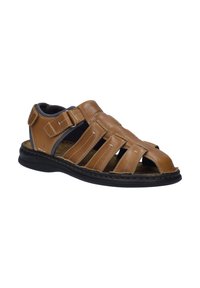 Brown leather sandal with open toe design, curved straps, adjustable buckle, and contrast stitching on a black sole.
