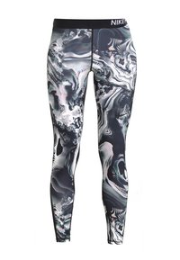 Leggings Nike ajustados con un patrón abstracto en espiral en blanco y negro y una cintura elástica negra que presenta el logotipo de Nike en blanco.
