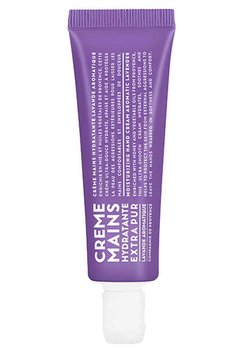Lila Tube mit Handcreme und weißem Text. Enthält Lavendel und Honig. Hat einen Klappdeckel. Der Text enthält Produktdetails in mehreren Sprachen.