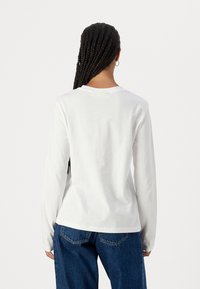 Calvin Klein Jeans REGULAR LONG SLEEVED - Tops ar garām piedurknēm - bright white