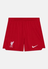Červené atletické šortky vyrobené z lehké látky, s elastickým pasem, vyšitým logem Liverpool FC a bílým swooshem Nike.