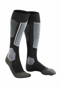 Calze fino al ginocchio in nero e grigio, caratterizzate da un mix di materiali, talloni rinforzati e distintive macchie grigie per supporto e durata.