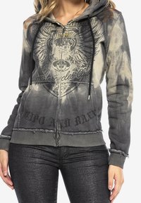 Grijze hoodie met ritssluiting met een vervaagde tie-dye print, voorzien van een leeuwengrafiek, de tekst "Motorcycle Club" en verweerde zoomdetails.