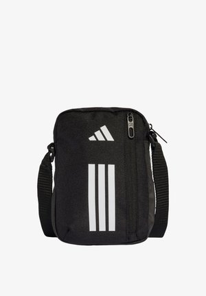 Černá látková kabelka přes rameno se zipovým uzávěrem, s třemi bílými pruhy a logem. Nastavitelný popruh pro pohodlí.