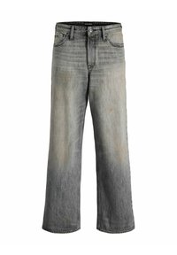 Jean large en denim gris délavé avec un léger effet ombragé. Doté de poches avant et d'un détail de couture visible. Marques d'usure subtiles présentes.