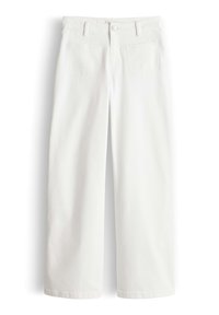 White high-waisted wide-leg jeans with front button, zipper, belt loops, and two front pockets on a white background.