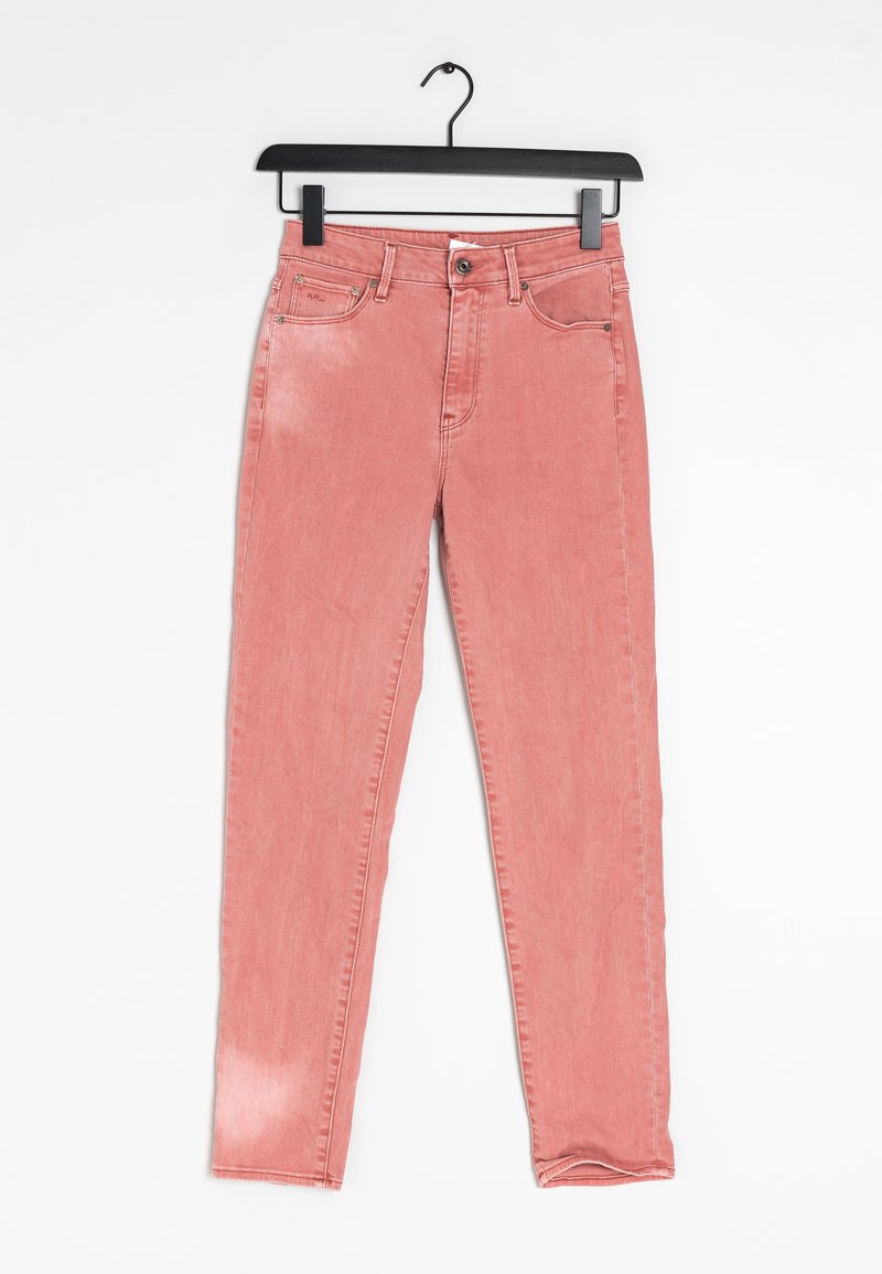 Pink denim jeans with a slim fit, featuring five pockets, a button closure, and contrasting stitching. The fabric has a soft, worn texture.