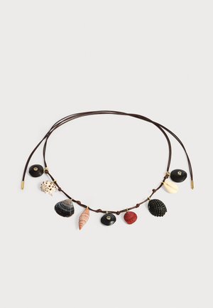 Brown cord necklace with assorted natural seashell charms in various shapes and colors arranged along the center.