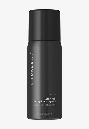 Bombe de spray déodorant cylindrique noire avec la marque "Rituals" et un texte indiquant un spray anti-transpirant 24h pour hommes, bois de cèdre, vitamine E, 150 ml.