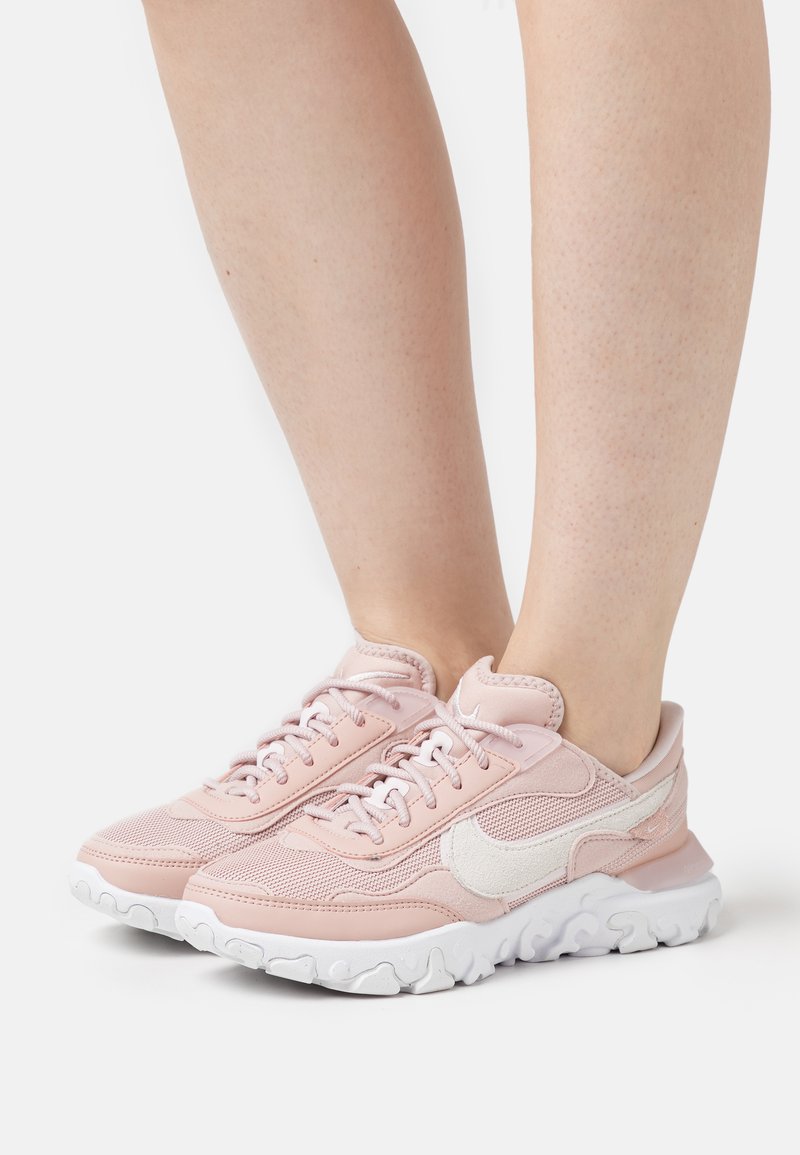 womens white react trainers