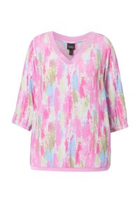 Bavlněná blůza v mnoha barvách s výstřihem do V, zdobená vzorem skvrn od barvy v růžové, modré a zelené barvě; rukávy po lokty; jemná a lehká tkanina.