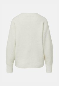 Cremefarbener Pullover mit gerippter Struktur, überschnittenen Schultern und langen Ärmeln. Verfügt über einen runden Ausschnitt und ein lockeres Design.